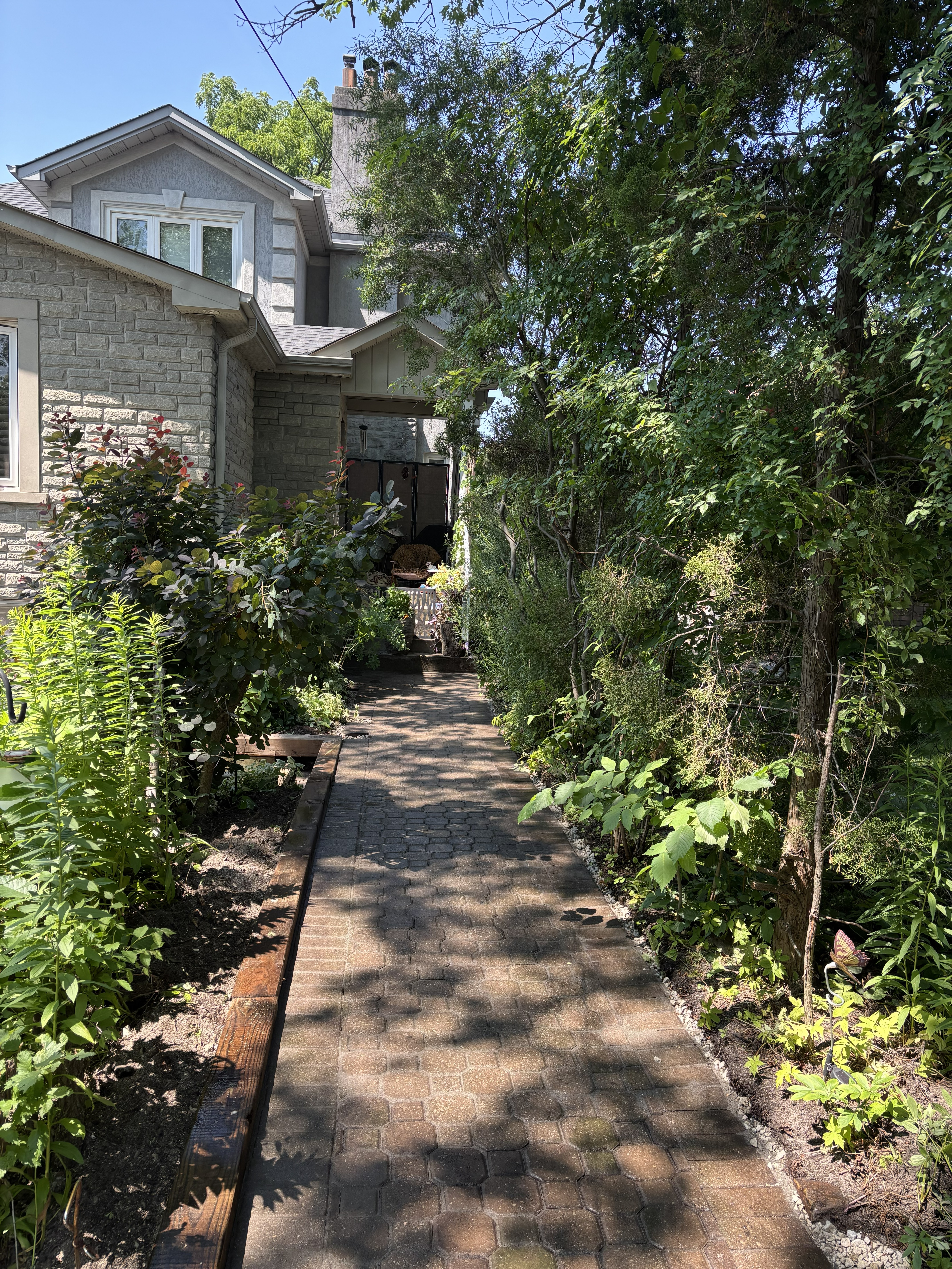 Interlock walkway installation along a side yard in Etobicoke